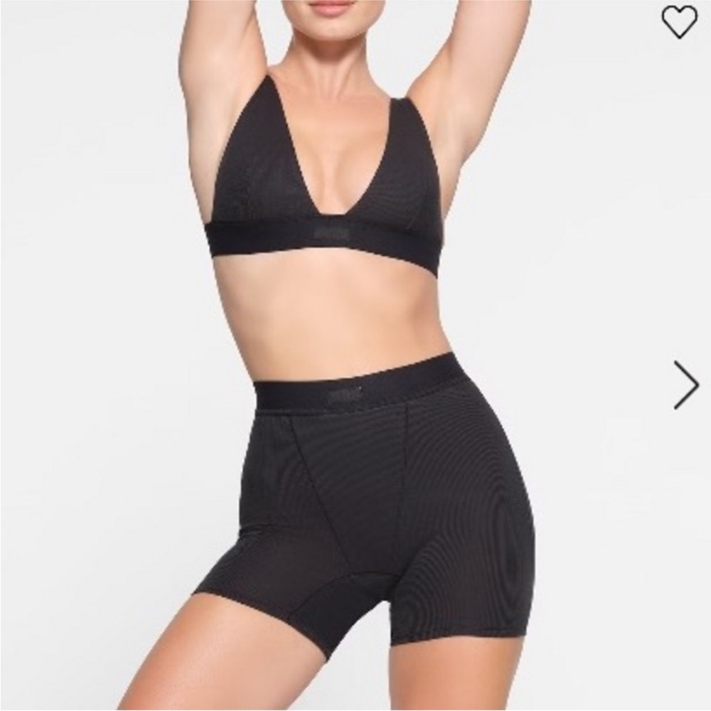Skims cotton ribbed boxer short in Black